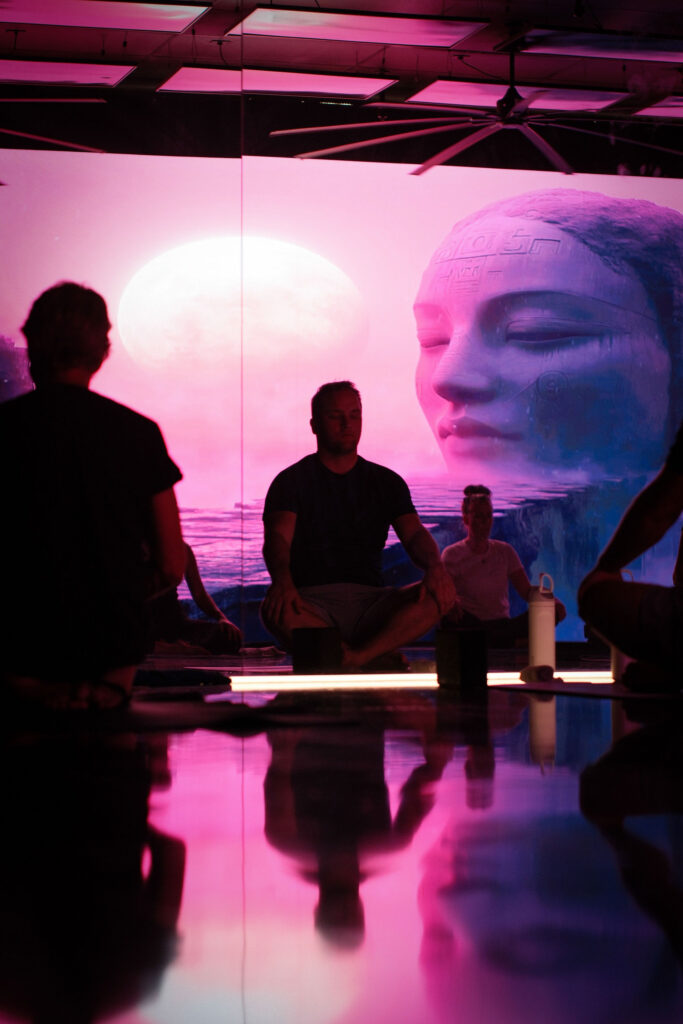 Yoga Teacher Training Arizona. Students practicing yoga teacher training Arizona at Namaste Yoga Scottsdale infrared studio.