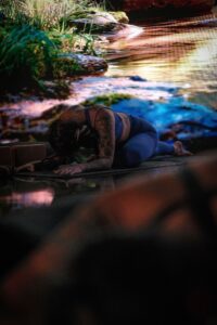 Modern yoga class at Namaste Yoga Scottsdale featuring immersive cinematic visuals and infrared heated wellness experience.